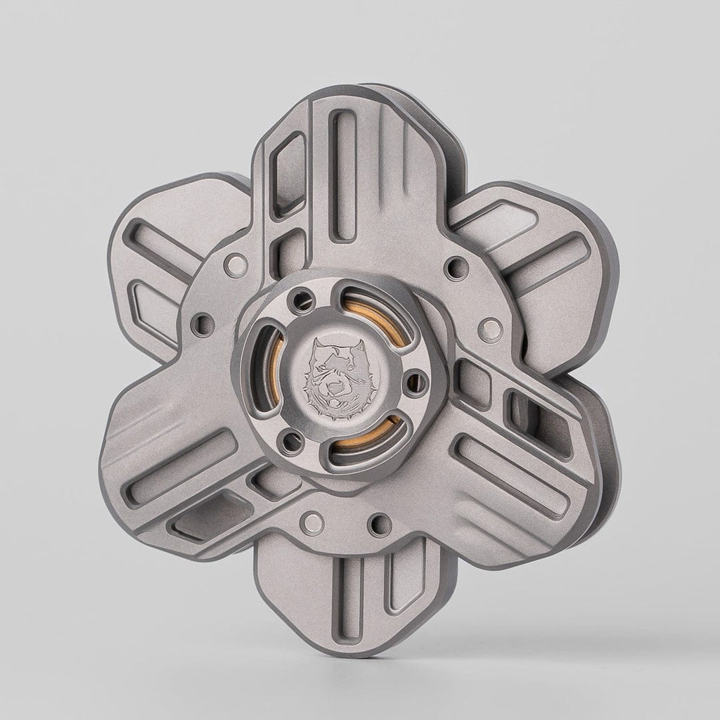 Tri linkage spinner