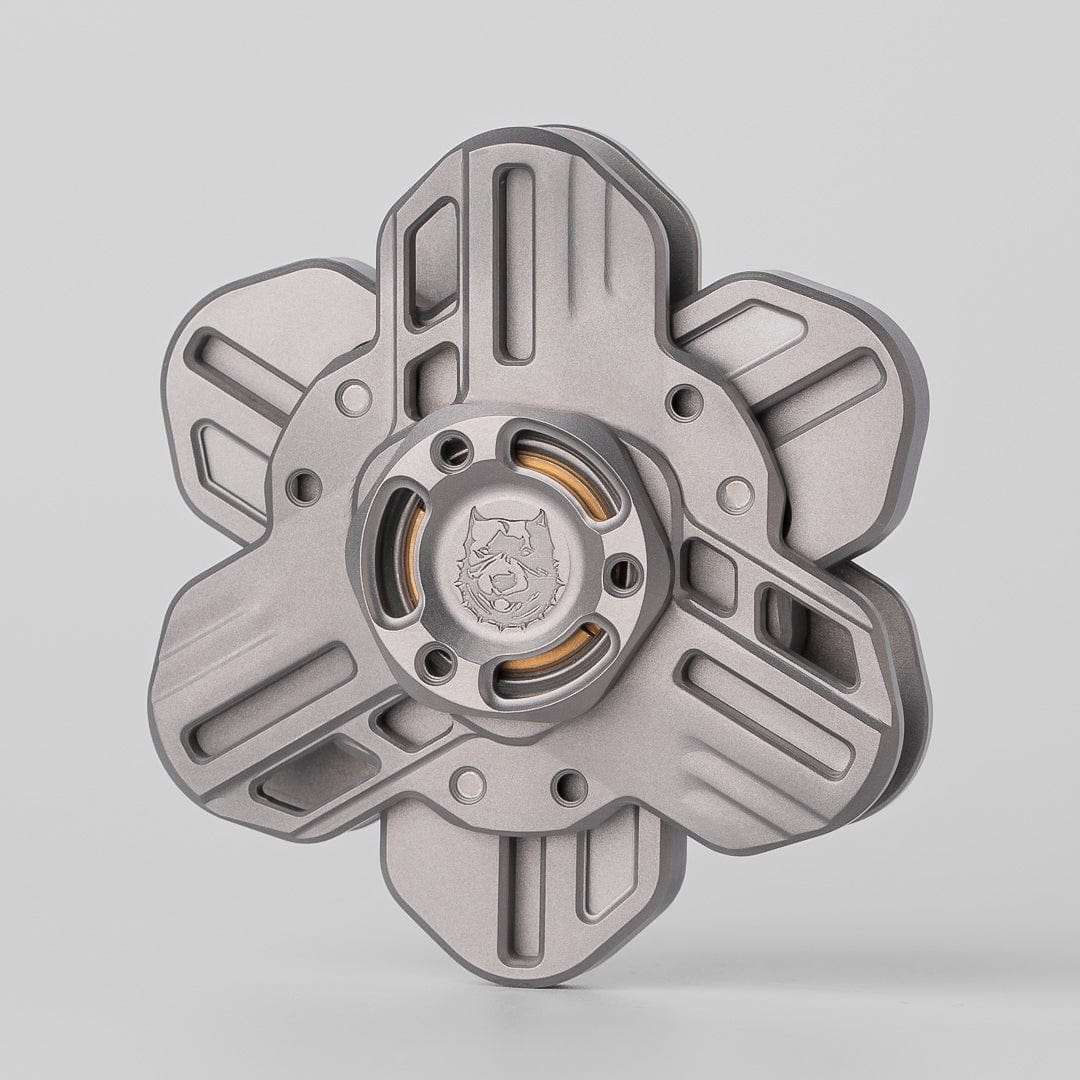 Tri linkage spinner