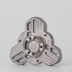 Tri linkage spinner