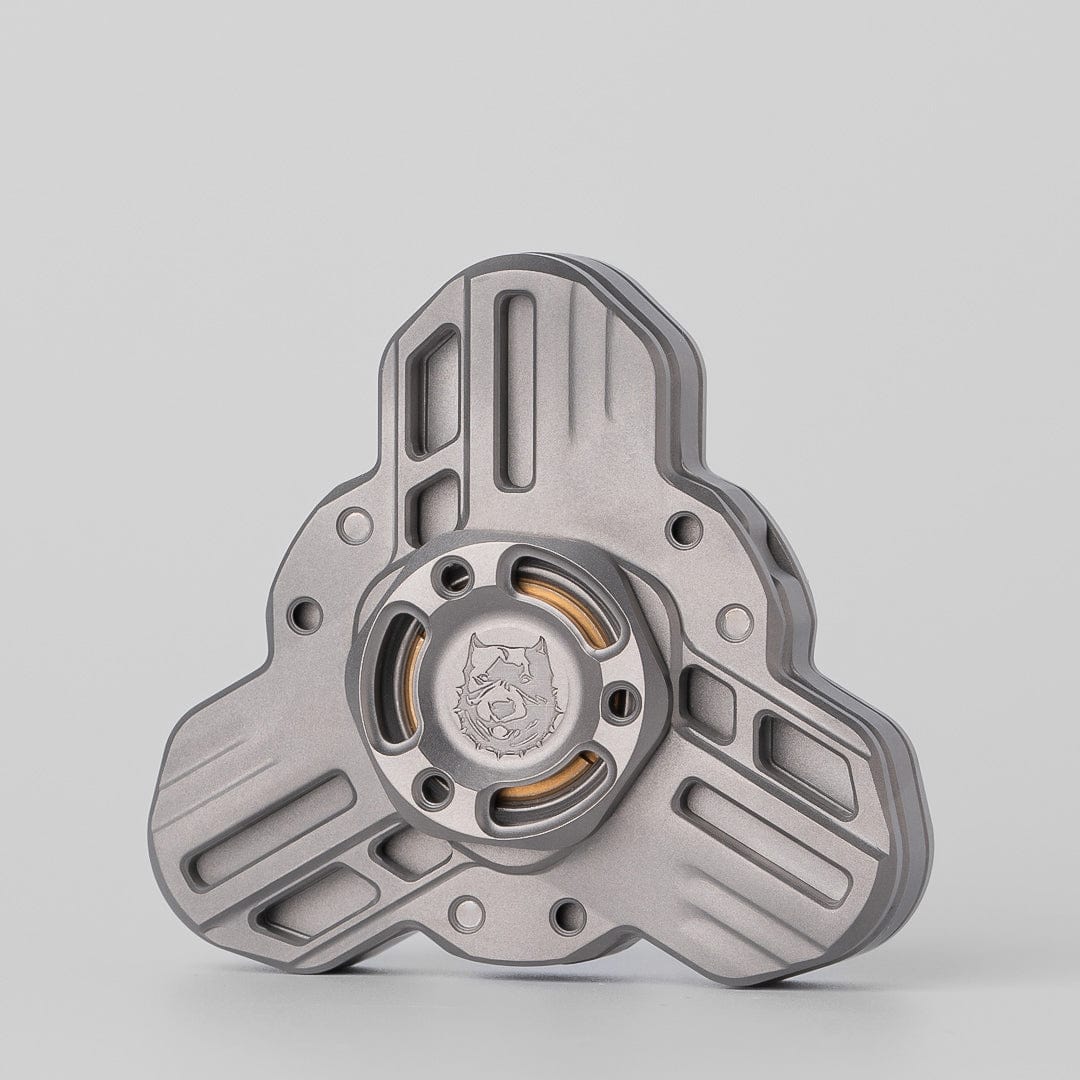 Tri linkage spinner